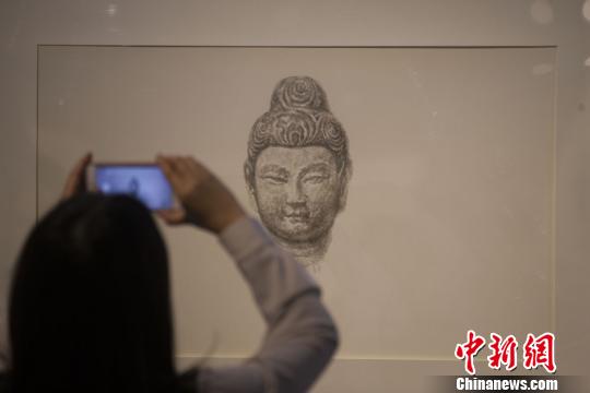 天龙山石窟流失海外佛像“重现故里”