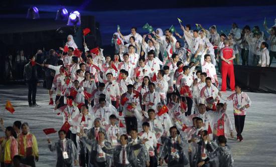 雅加达亚运会闭幕式上的中国代表团。新华社记者丁汀摄