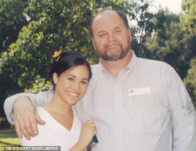20347358-7627909-Meghan_Markle_in_her_younger_days_with_her_father_Thomas_Markle_-a-1_1572422954664.jpg