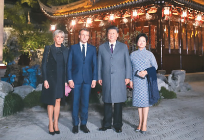 习近平夫妇在上海会见法国总统马克龙夫妇