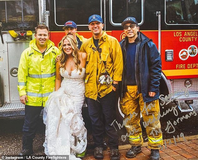 21174426-7699195-Saving_the_day_Julie_Gorman_was_escorted_to_her_wedding_in_March-a-20_1574114821192.jpg