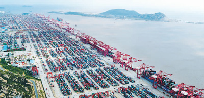 中国扩大开放跑出“加速度”