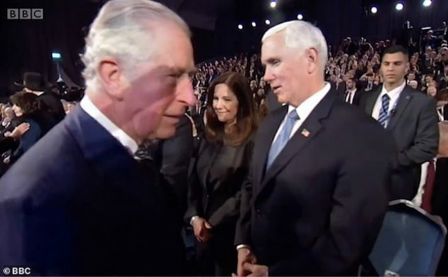 23782262-7921449-Prince_Charles_appeared_to_snub_Vice_President_Mike_Pence_at_an_-m-44_1579798151722_meitu_4.jpg