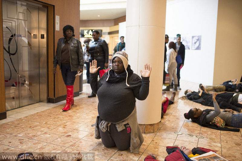 人民日报钟声：“美式人权”竟是由肤色决定的