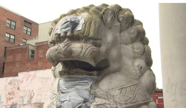 加拿大唐人街石狮子被涂辱华字样，警方：严查