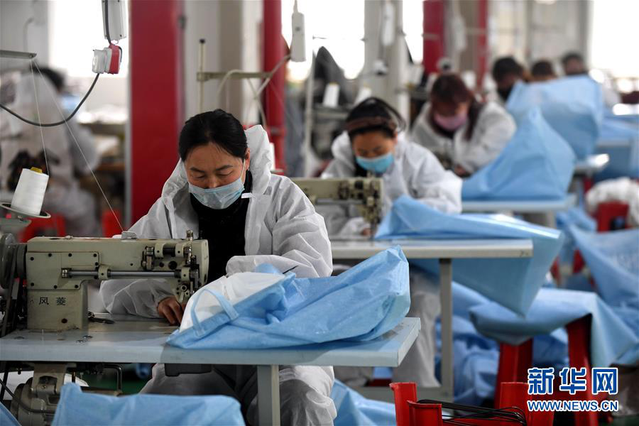 外媒解读政府工作报告:脱贫攻坚展中国决心 向世