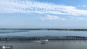 受强降雨影响 江西永修再现最美水上公路景观