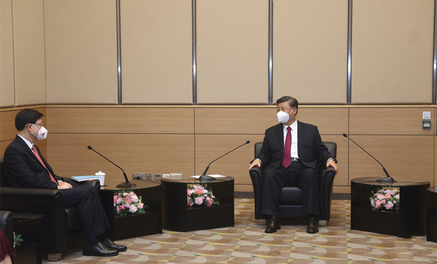 习近平会见李家超