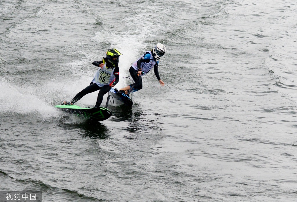 广州肿瘤医院黄牛代挂号电话票贩子号贩子网上预约挂号,住院检查加快,浙江省第十七届运动会电动冲浪板开赛 选手河面劈波斩浪