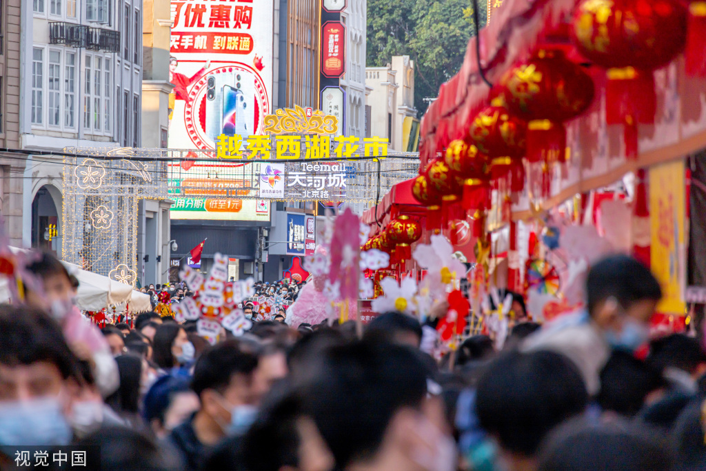 广州越秀西湖花市重启 灯光如昼人如织
