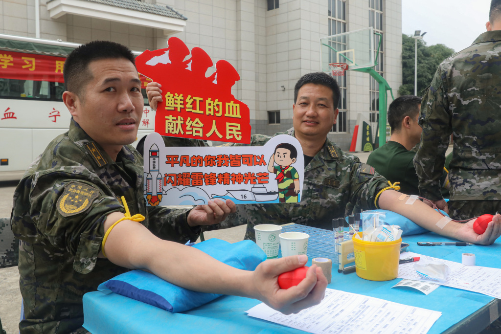 
天津肿瘤医院黄牛代挂号电话票贩子号贩子网上预约挂号,住院检查加快,南宁：学雷锋日将至 武警官兵献血传递爱心