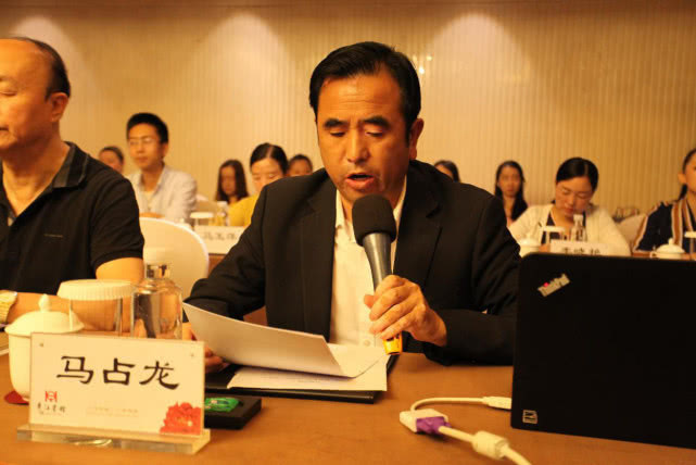 青海省餐饮行业协会会长马占龙中国烹饪协会特邀执行副会长李亚光中国