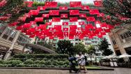 喜迎回归祖国27周年 香港街头悬挂国旗与区旗
