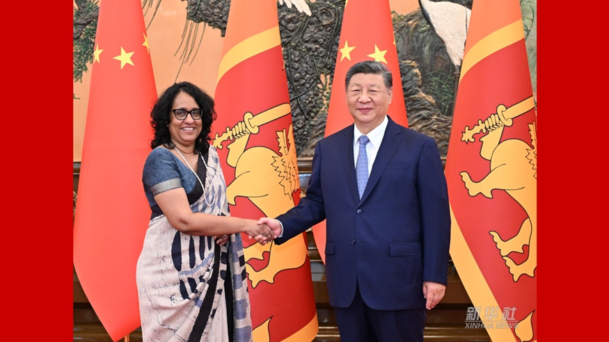 习近平会见斯里兰卡总理阿马拉苏里亚