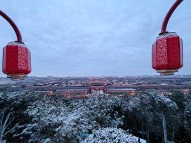北京迎马年首场降雪 故宫博物院银装素裹